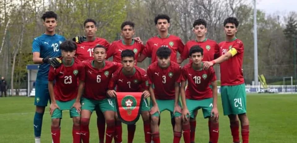 Moroccan youth football team posing on the field