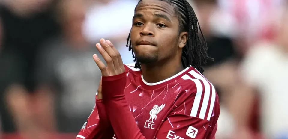 Player applauding fans during match at stadium