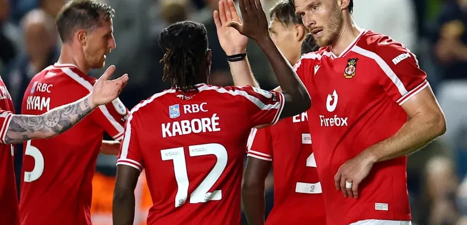 Players celebrating a goal during football match