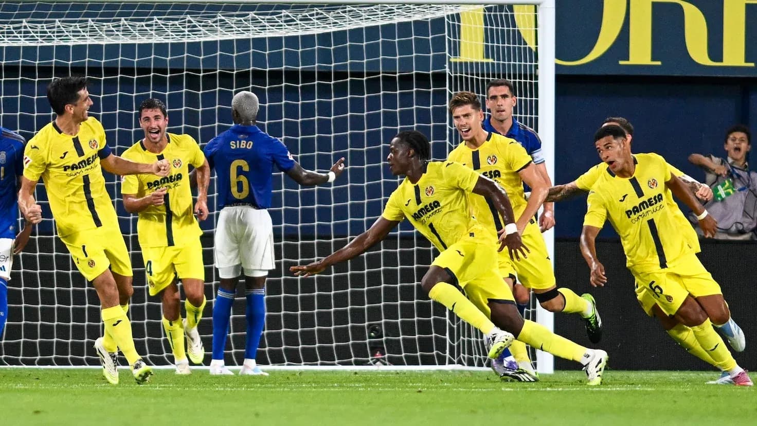 Villarreal players celebrating a goal against Oviedo