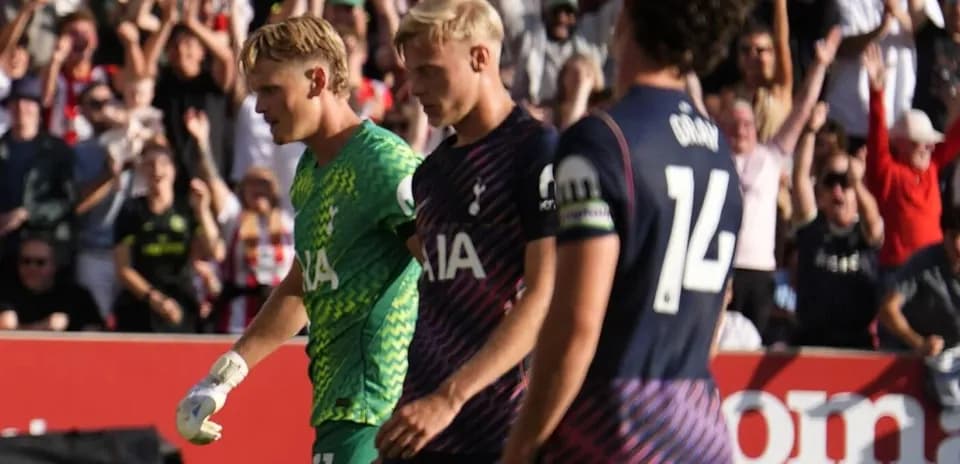 Tottenham players walking off the pitch after match
