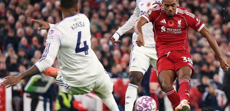 Player kicking ball during Aston Villa vs Liverpool match