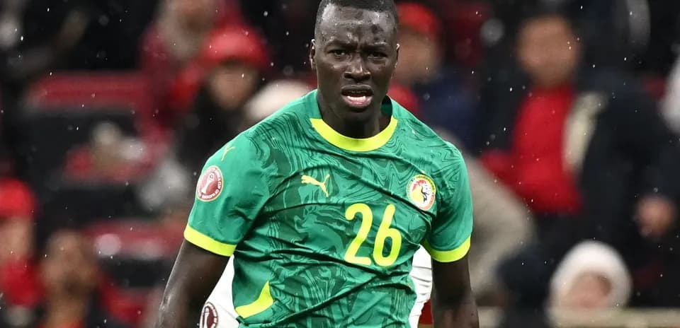 Player in green jersey during match action