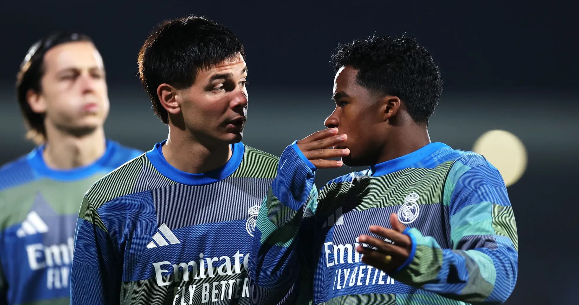 Two players discussing during training session
