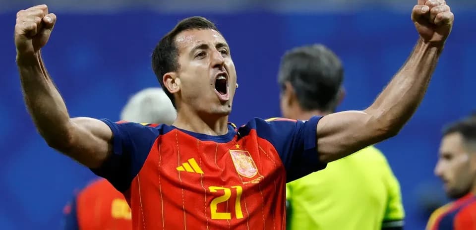 Player celebrating after scoring a goal for Spain