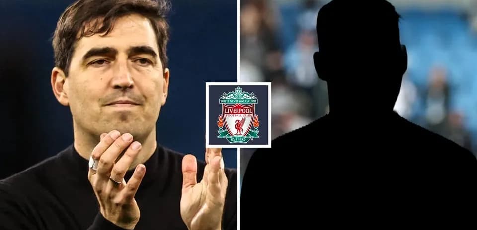 Manager clapping with Liverpool logo in background