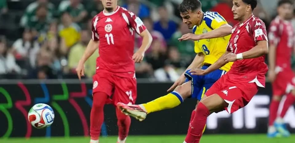 Sweden player shooting during match against Tunisia