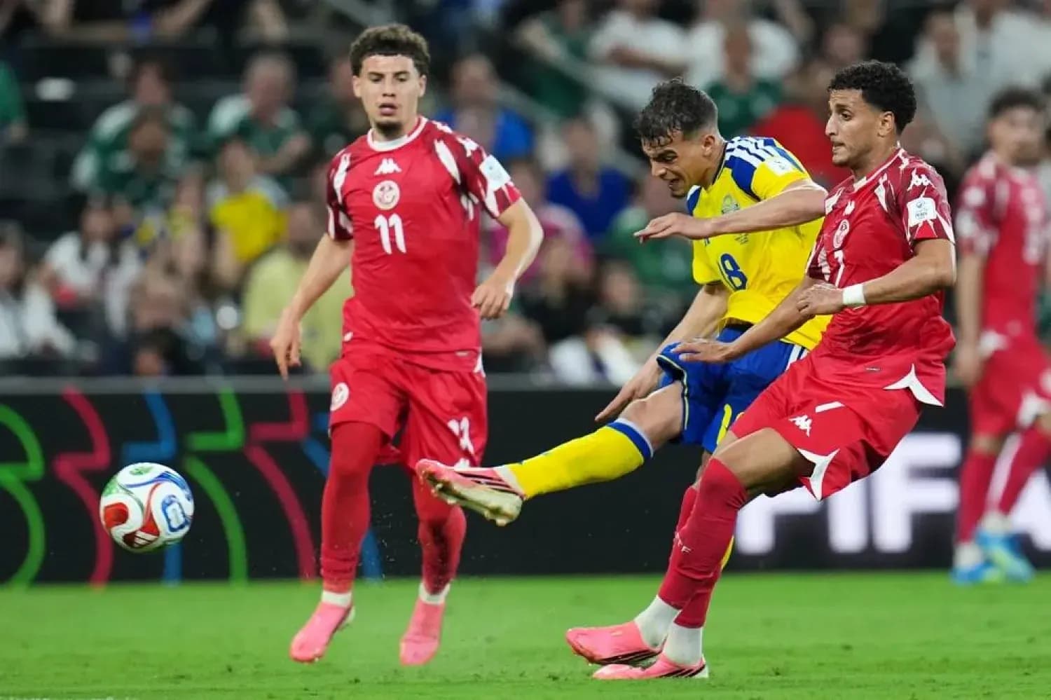 Sweden player shooting during match against Tunisia