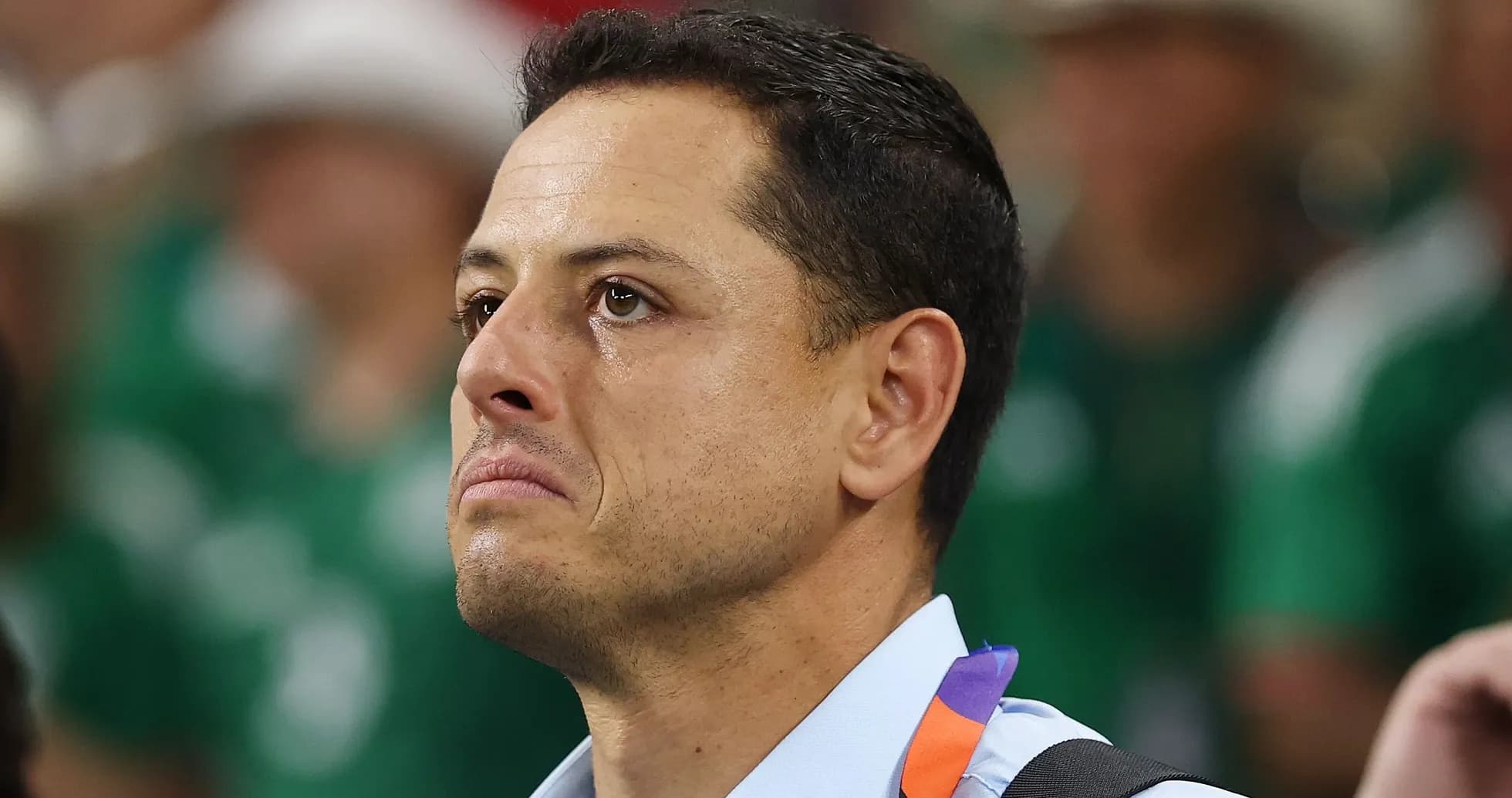 Man with a tear at a sports event