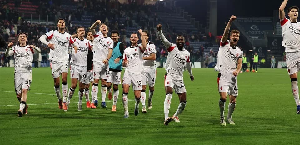 AC Milan players celebrating a victory
