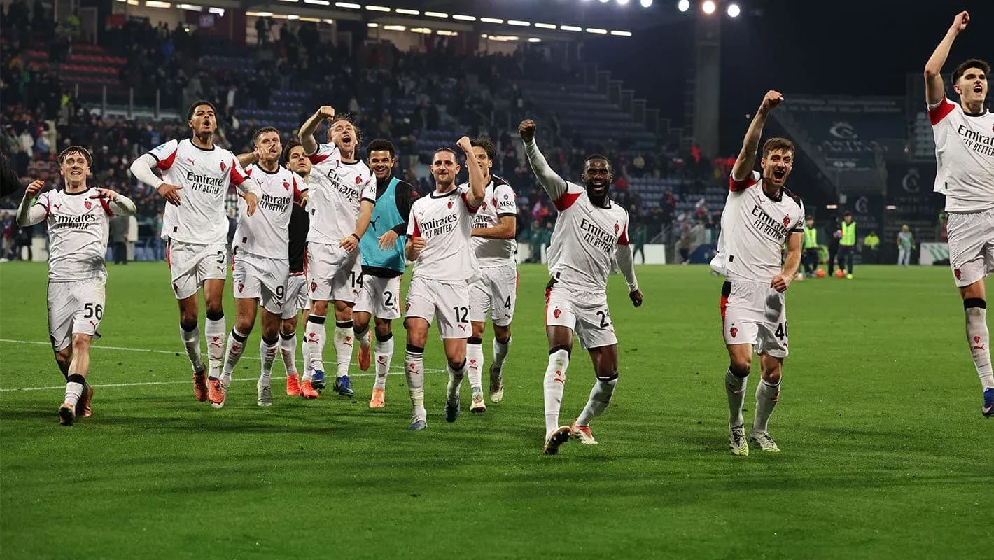 AC Milan players celebrating a victory