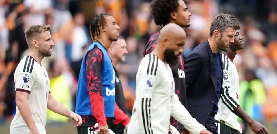 Players walking off the pitch after match