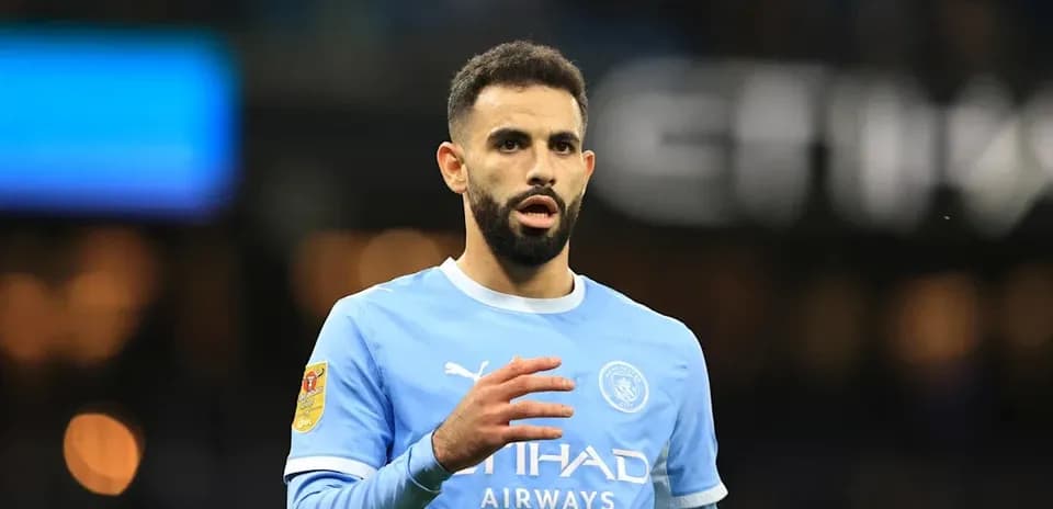 Player in light blue jersey during match