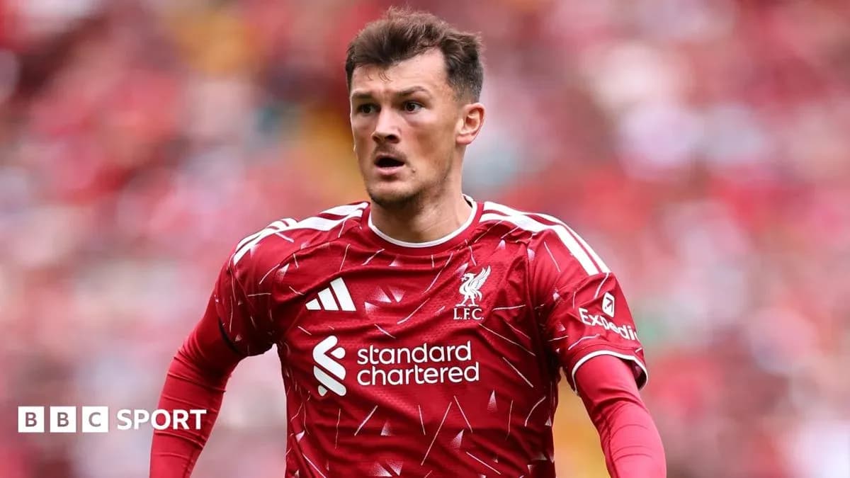 Player in red Liverpool kit on the pitch