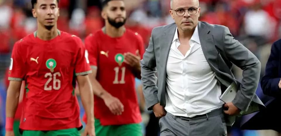 Moroccan players and coach after match