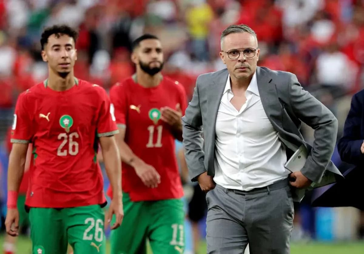 Moroccan players and coach after match