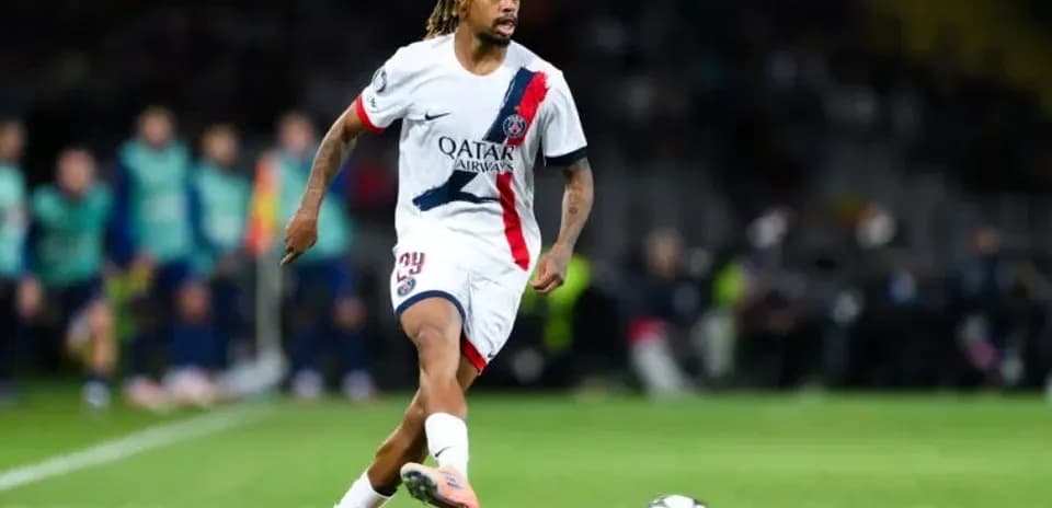 Player dribbling the ball during UEFA Champions League match