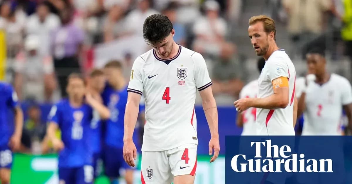 England players walking off the pitch after match