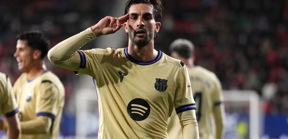 Player celebrating with a salute gesture on field