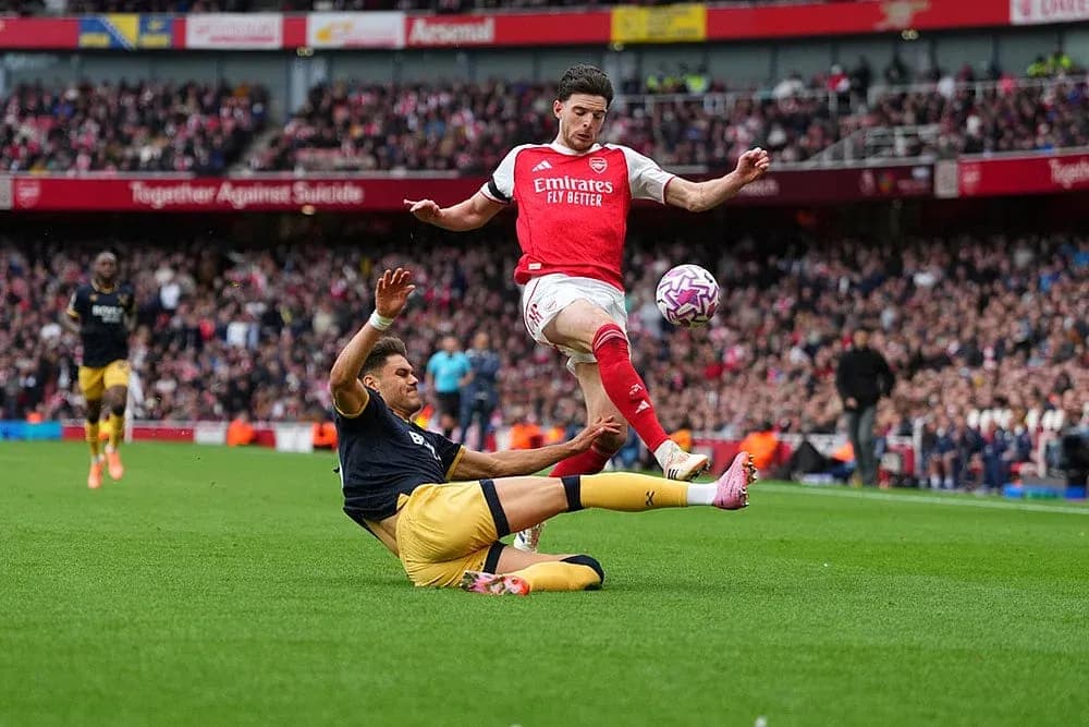 Player tackling during West Ham vs Arsenal match