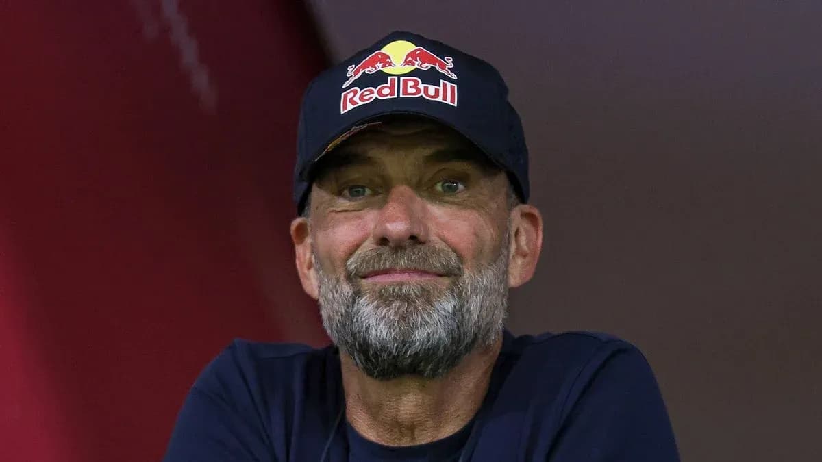 Man wearing a Red Bull cap smiling
