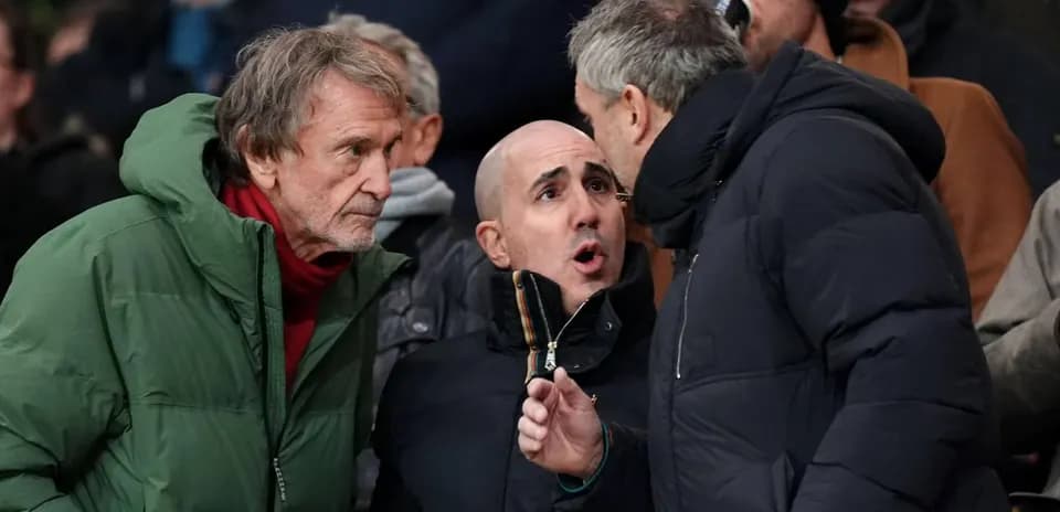 Three spectators engaged in a heated discussion