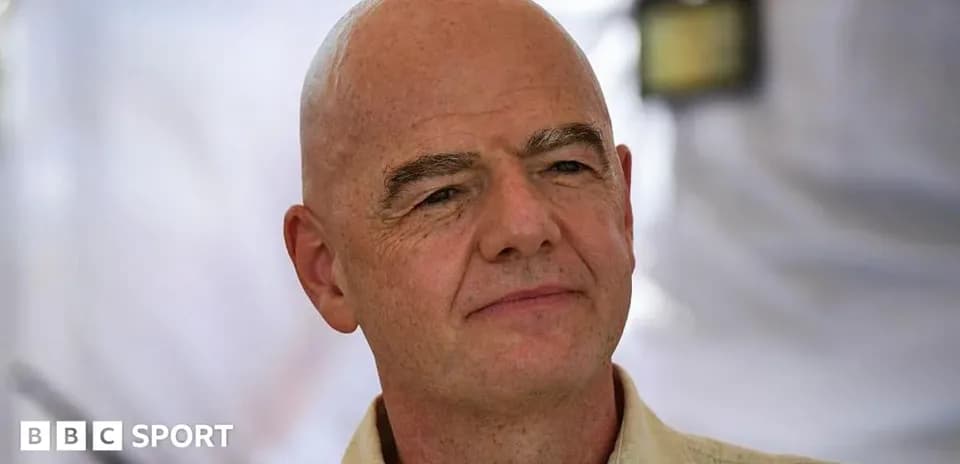 Man with a bald head in a light shirt