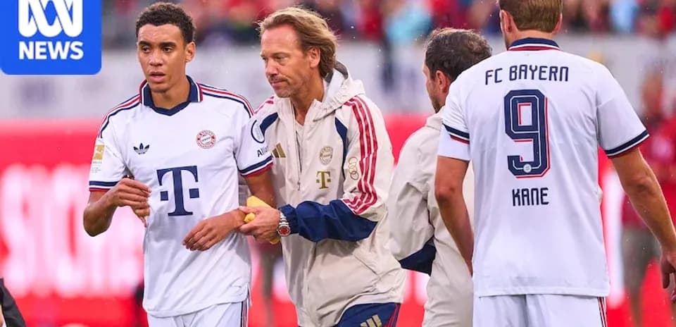 Bayern Munich players and coach during match substitution