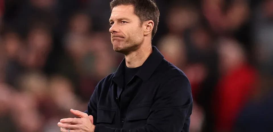 Coach observing the game from the sidelines