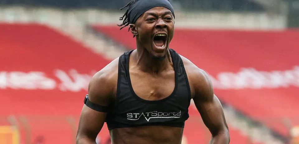 Athlete celebrating on the pitch during training