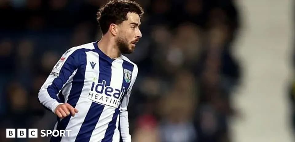 Player in West Bromwich Albion kit during match