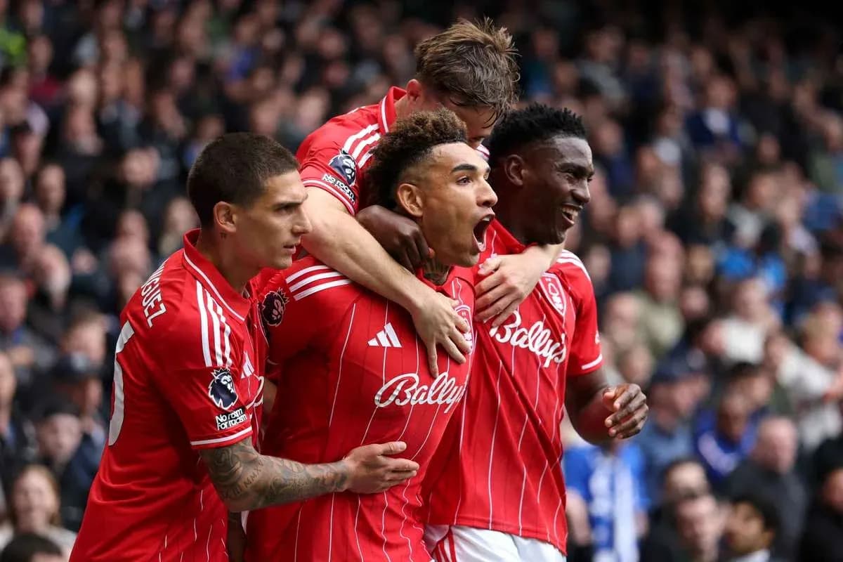 Players celebrating a goal on the pitch