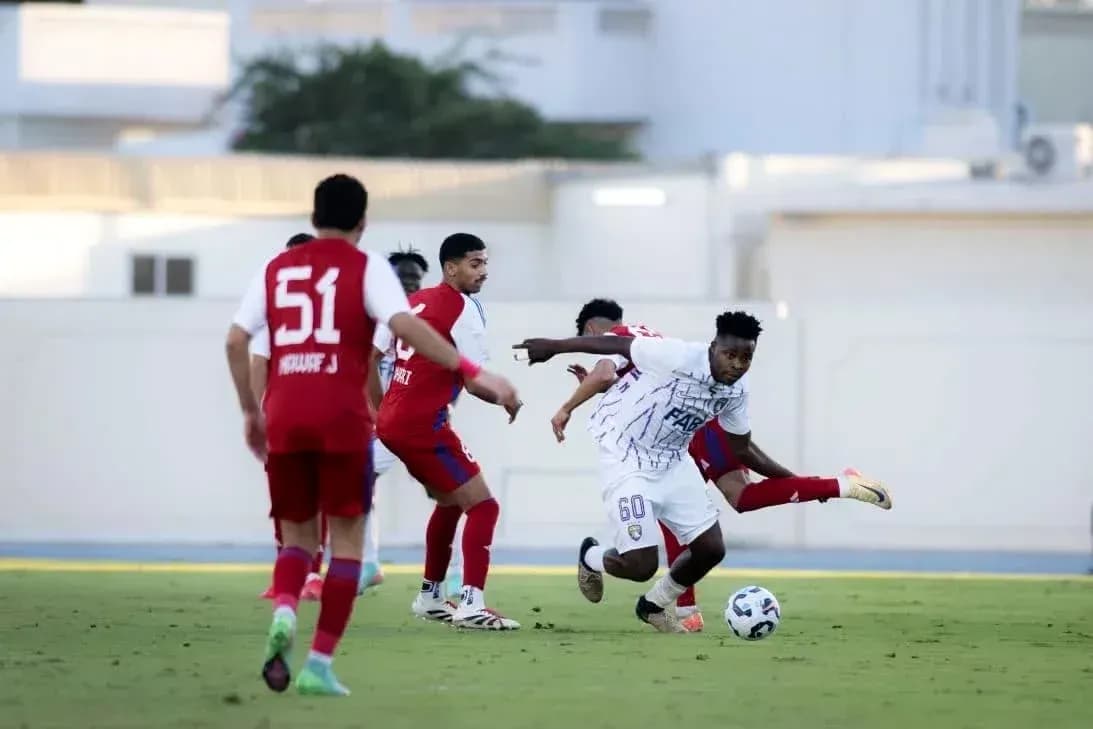 Al Ain U23 player dribbling against Al Sharjah U23