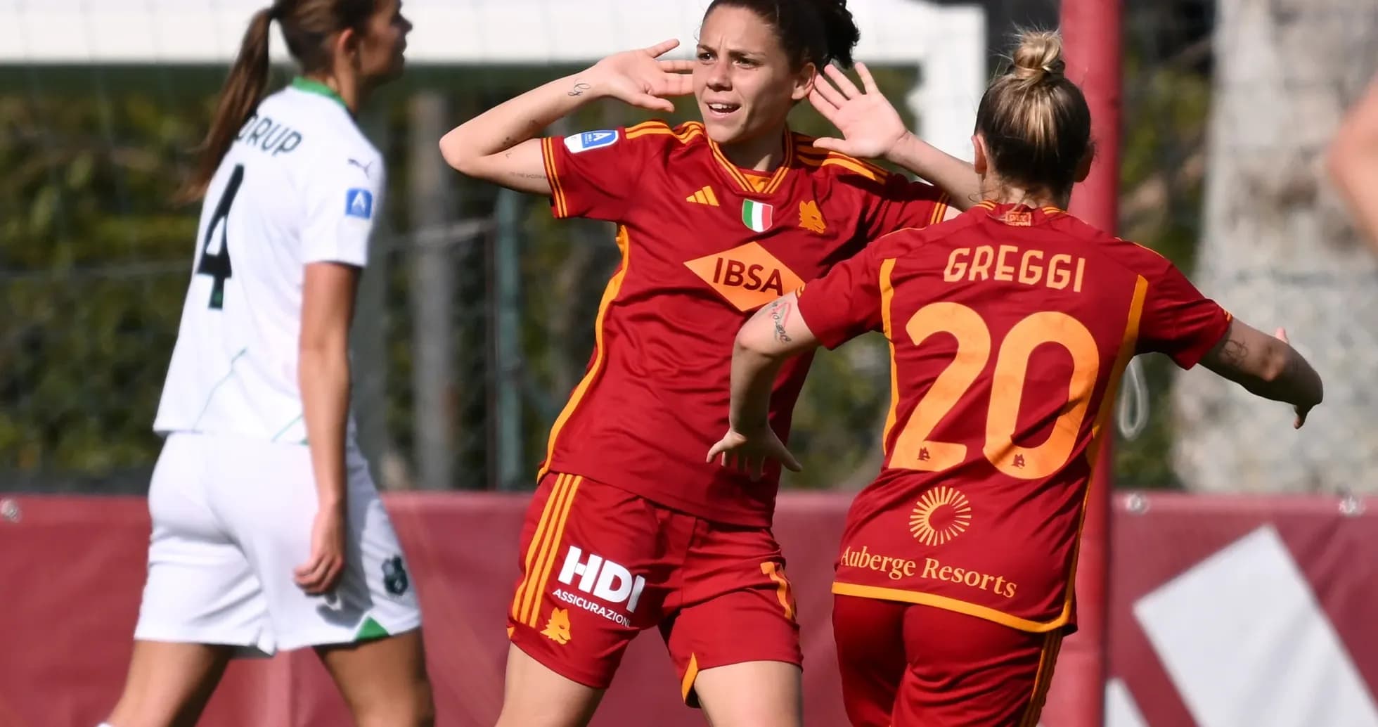 Roma W players celebrating a goal against Sassuolo W