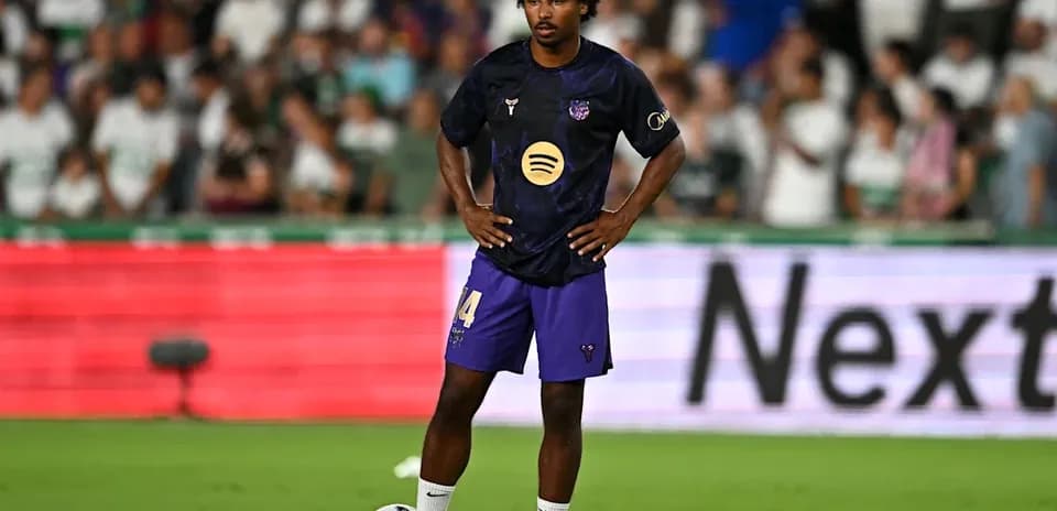 Player preparing for a free kick on the field