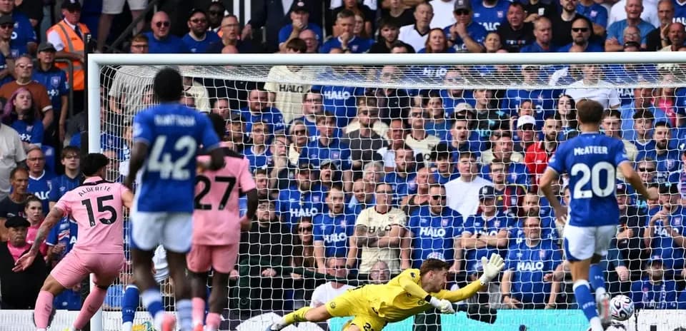 Goalkeeper diving to save a penalty kick