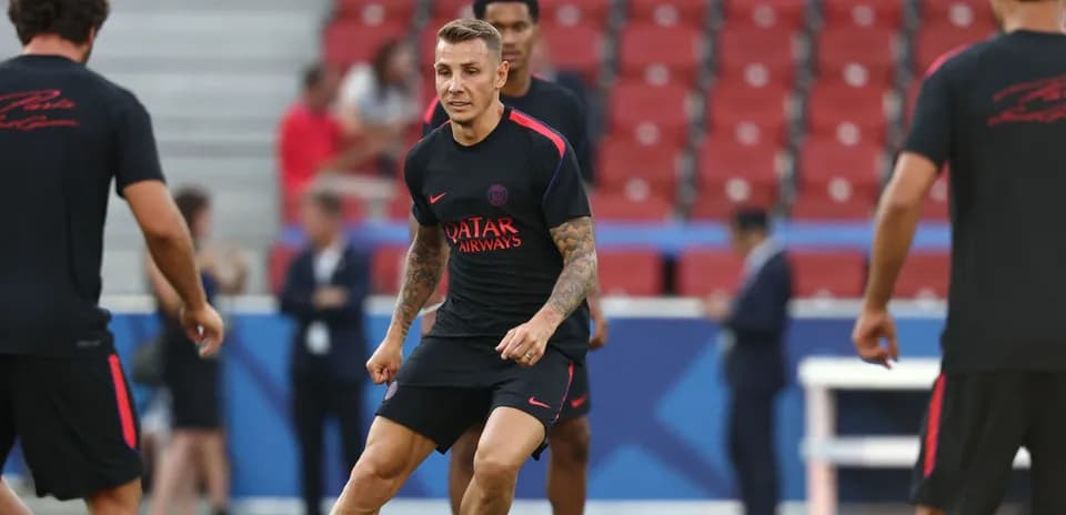 Player training on the pitch during warm-up session