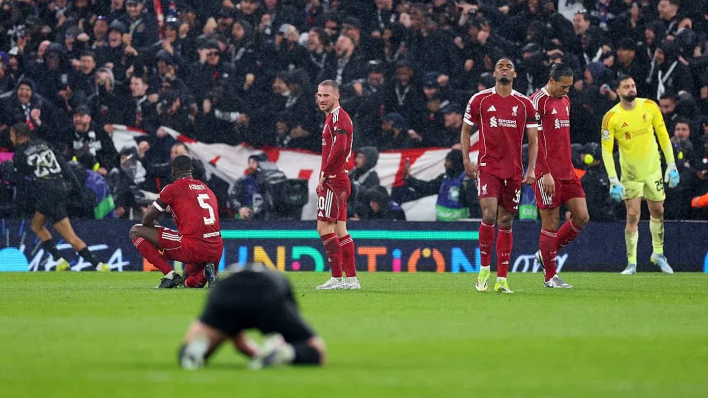 Liverpool players showing disappointment after match loss