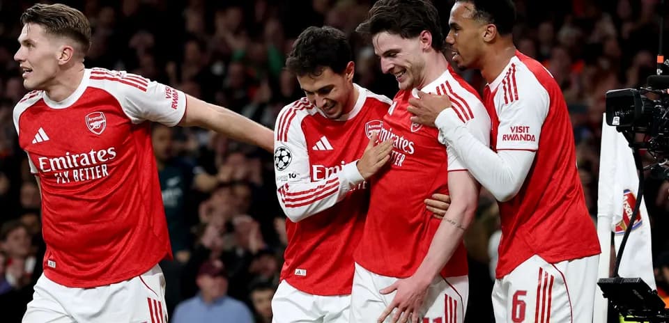Arsenal players celebrating a goal during match