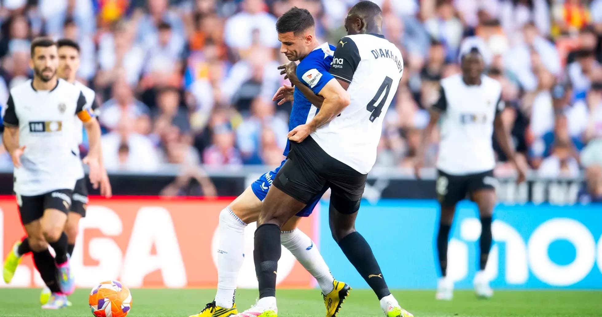 Player tackling during Athletic Club vs Valencia match