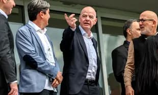 Officials discussing during an event at stadium