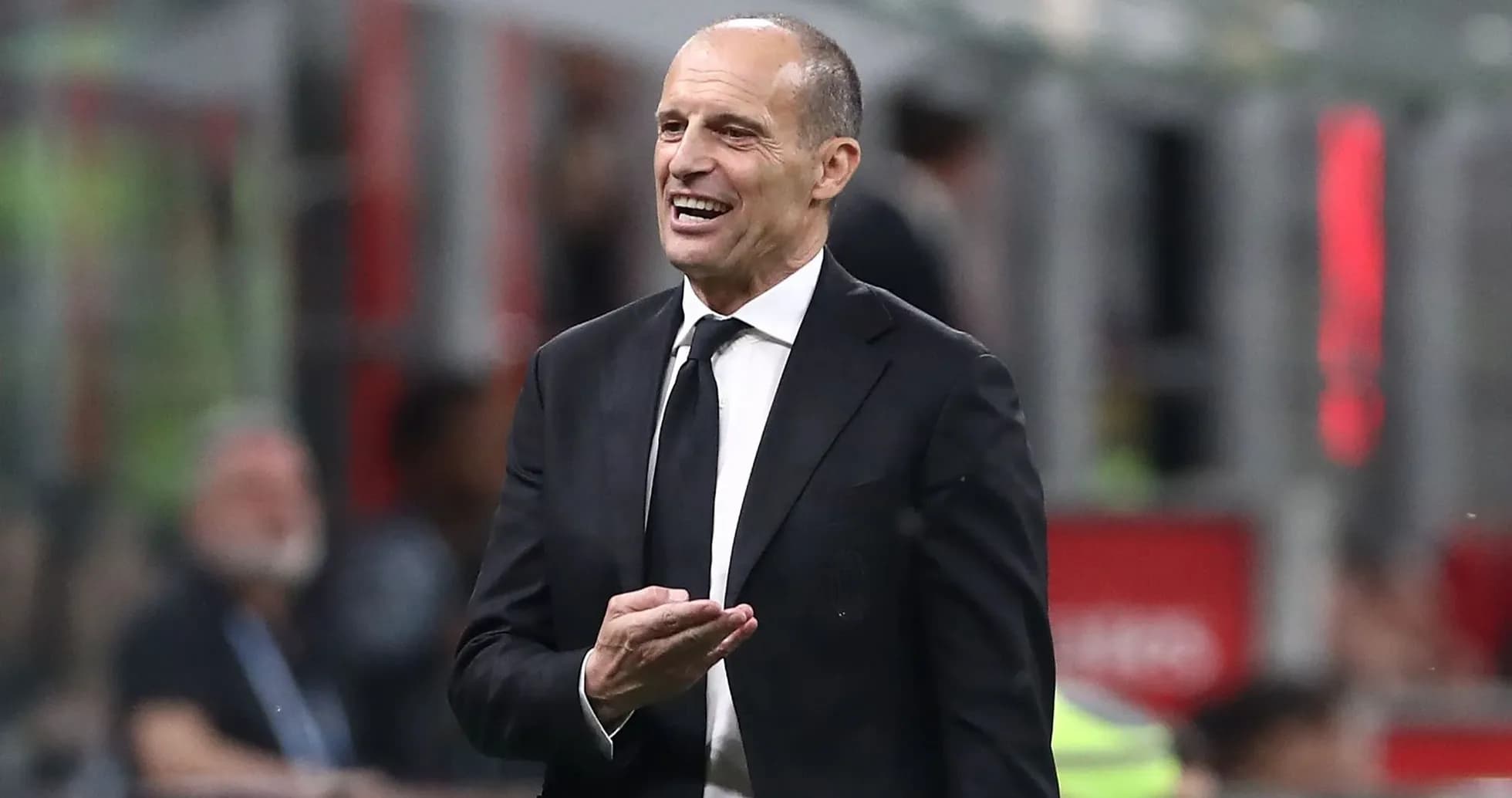 Coach gesturing during match from the sidelines