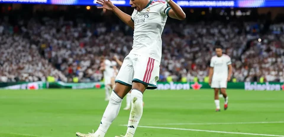 Player celebrating after scoring a goal in match