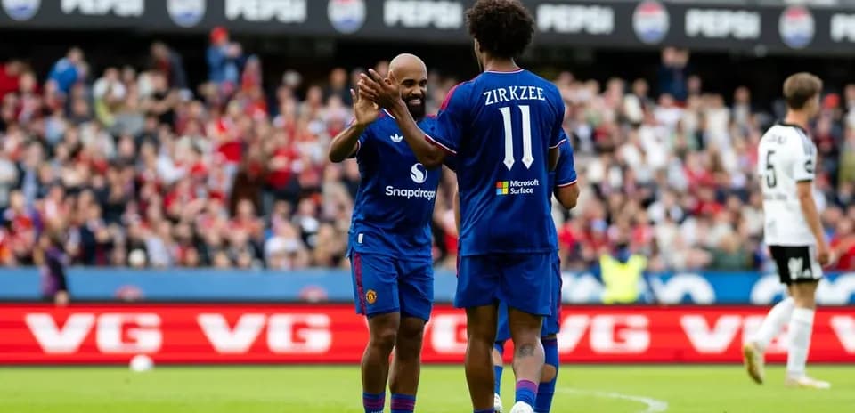 Players celebrating on the field during match