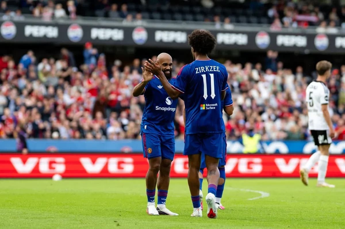 Players celebrating on the field during match