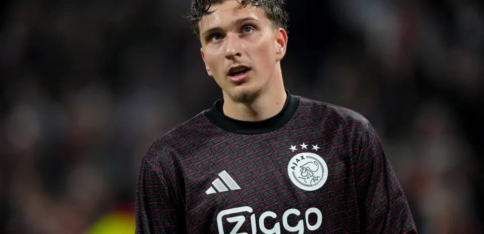 Goalkeeper in Ajax uniform during match