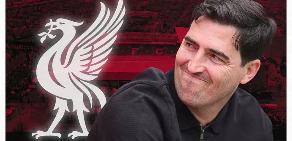 Man smiling with Liverpool logo and stadium background