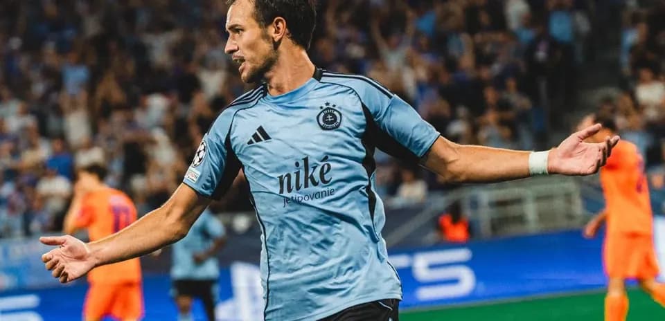 Player celebrating during UEFA Champions League match