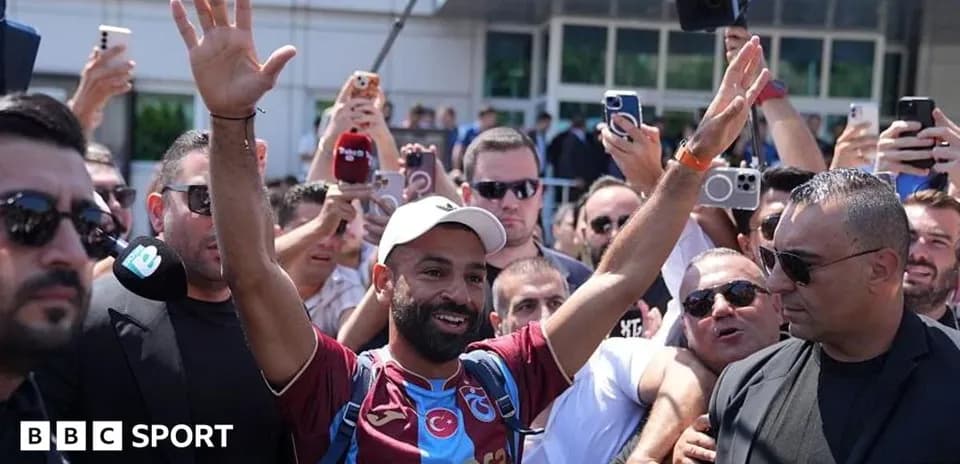 Player greeting fans outside club facility