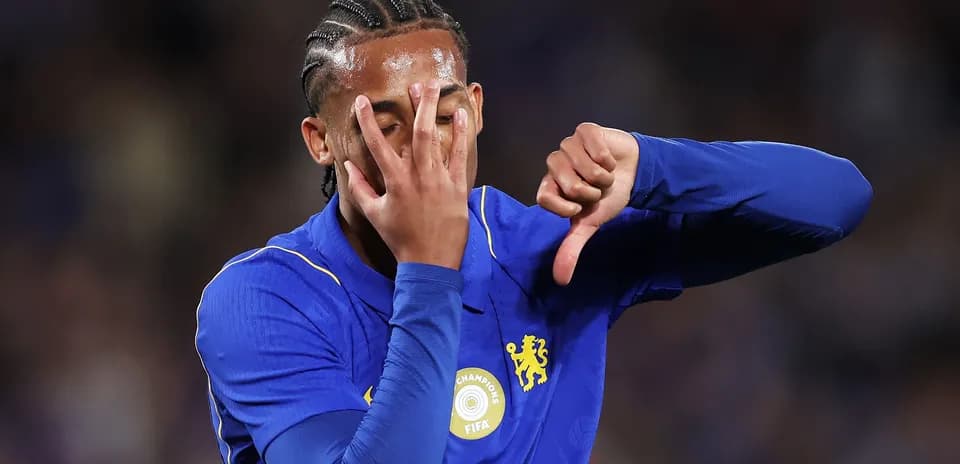 Player in blue jersey gesturing during match